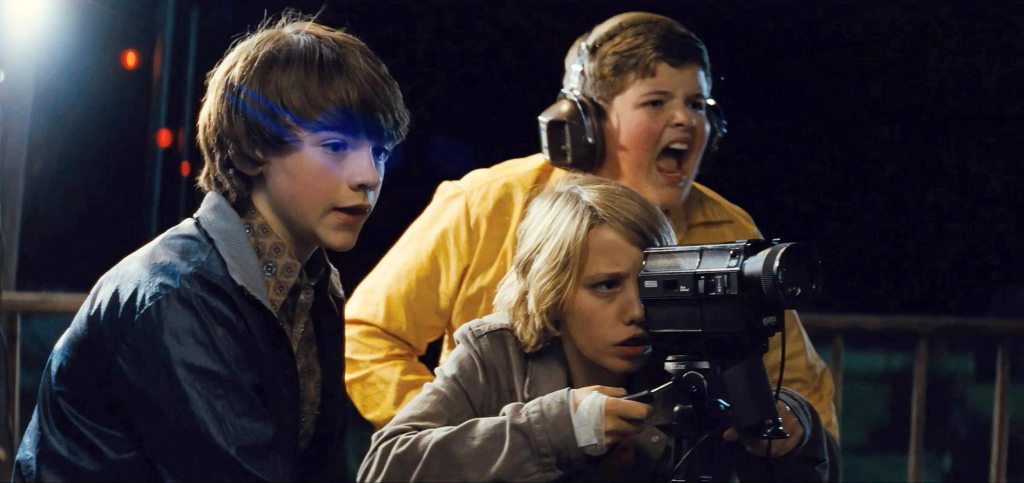 Super 8 (2011): Captivating Nostalgia and Thrills in J.J. Abrams’ Sci-Fi&nbsp;Gem